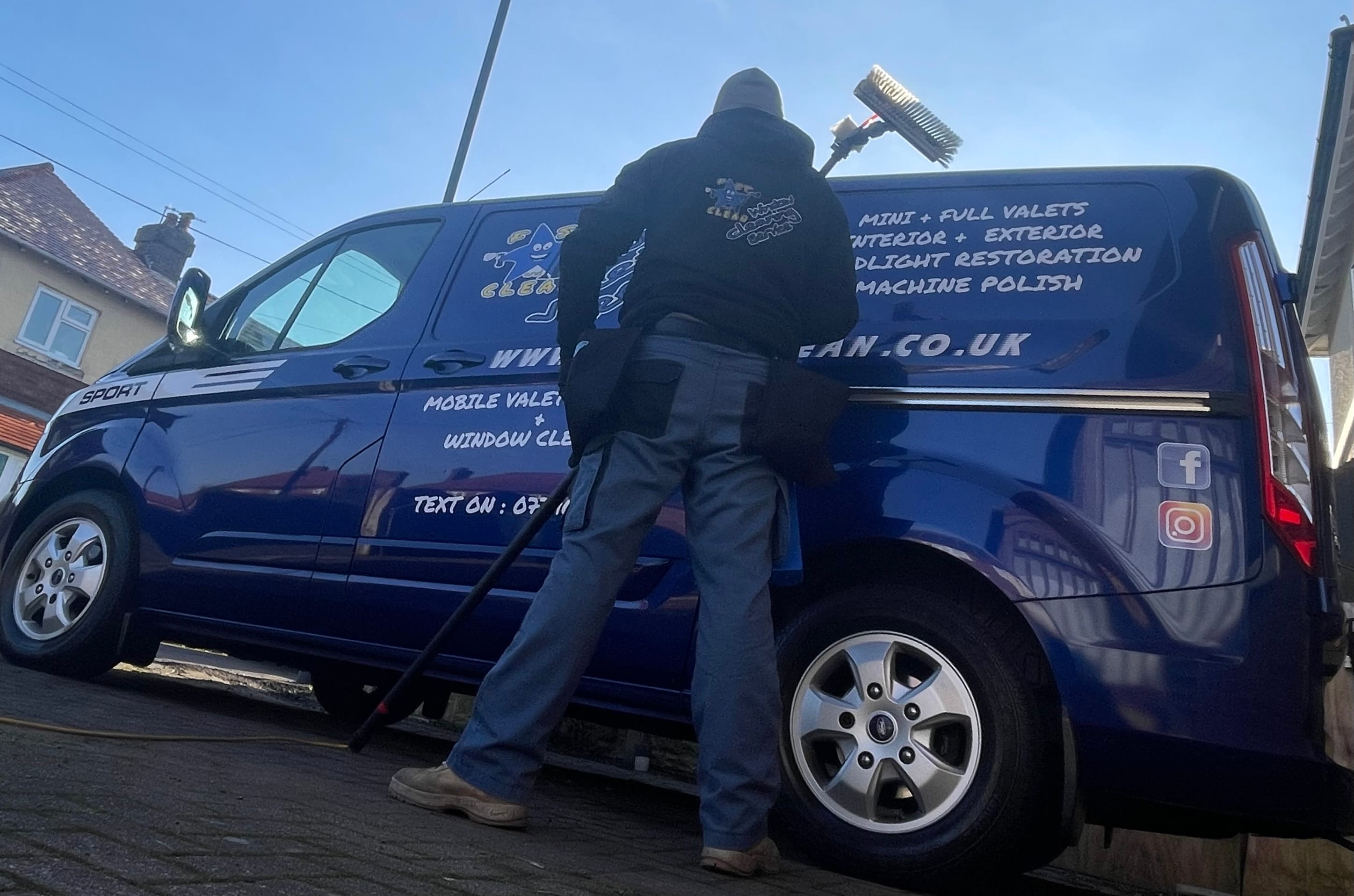 Fast and Clean window cleaner with branded van